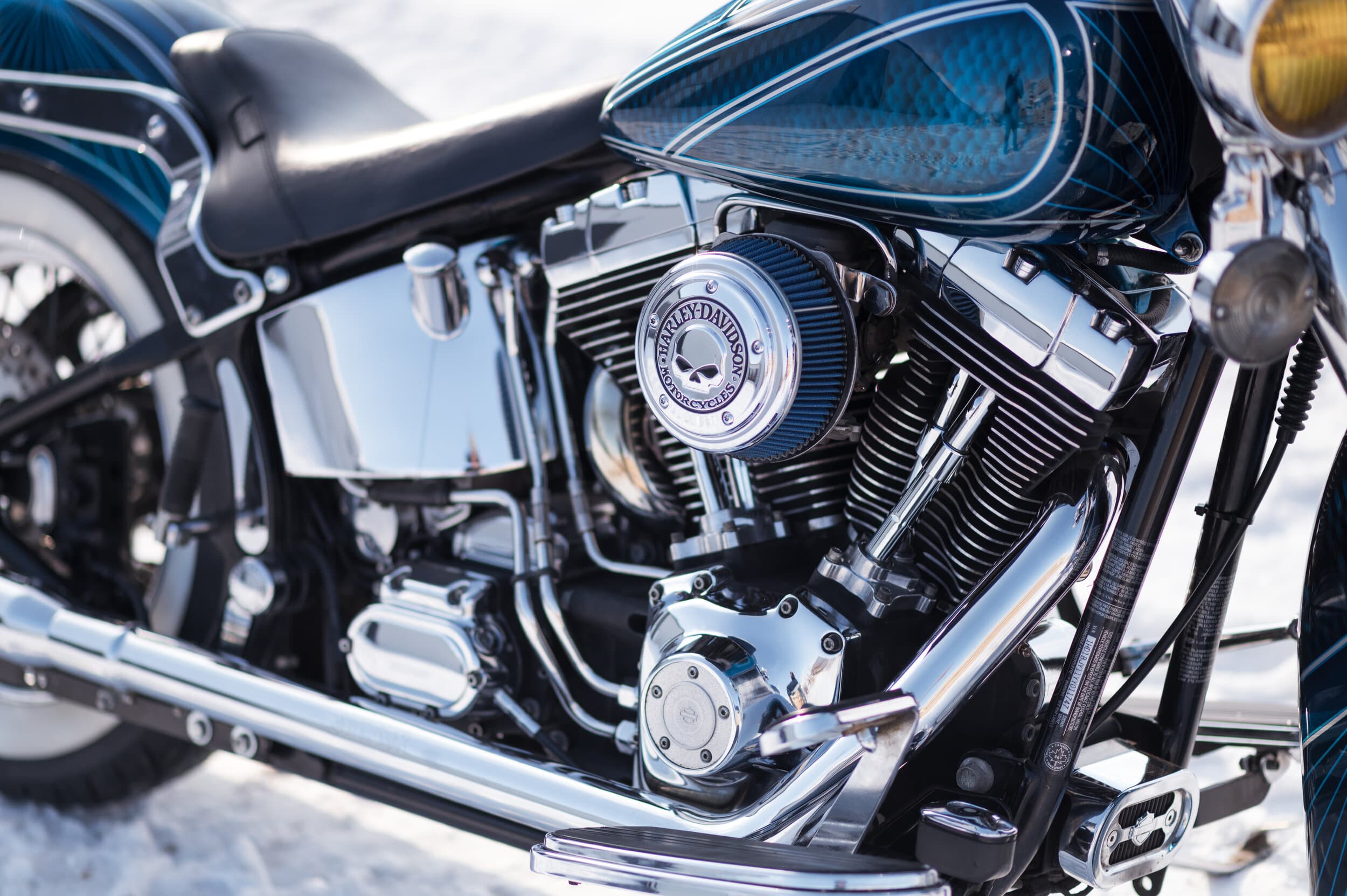 Close-up of a Harley-Davidson V-twin with a high-flow air cleaner and chrome covers